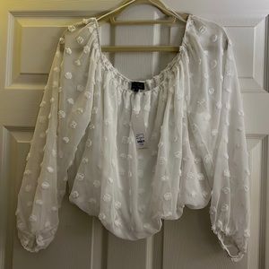 Francesca’s white cropped shirt